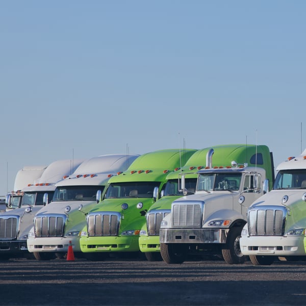 Fleet of vehicles in a parking lot highlighting fleet leasing