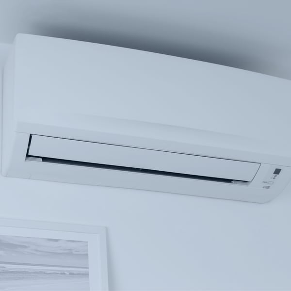 A wall-mounted mini-split air conditioning unit, representing the HVAC/R industry